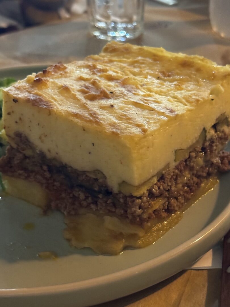Close-up of a shepherd's pie with layers of mashed potatoes and minced meat.