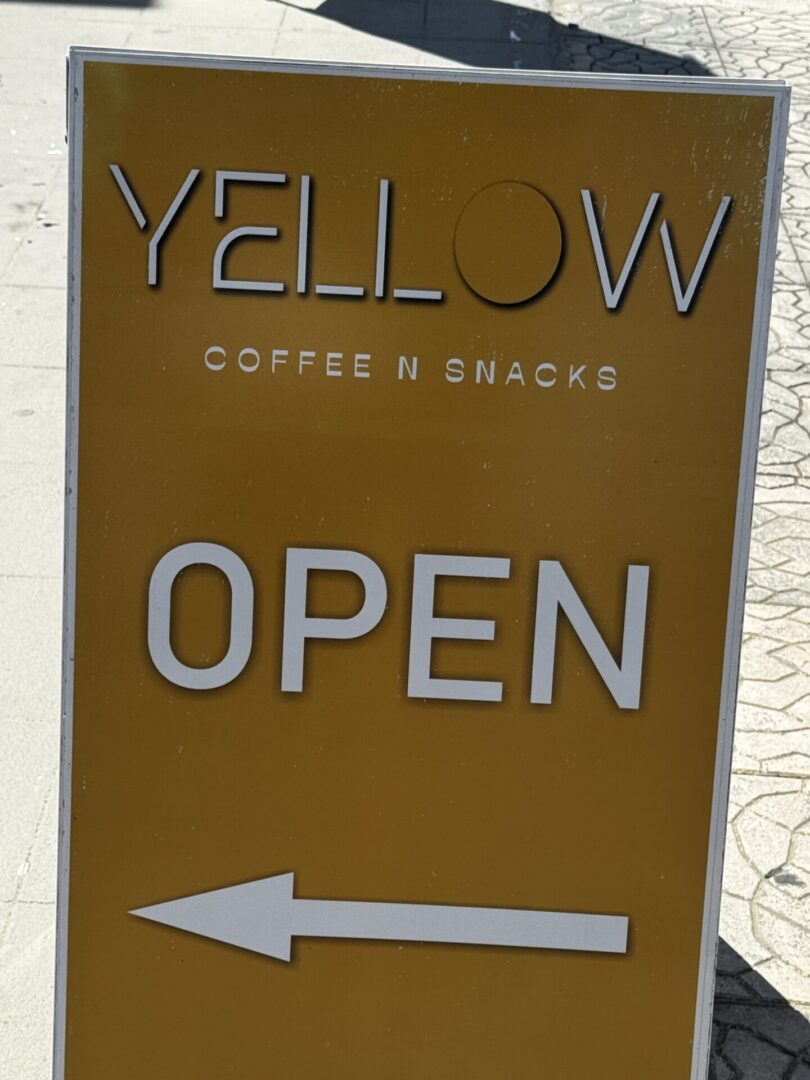 Open sign for Yellow Coffee N Snacks