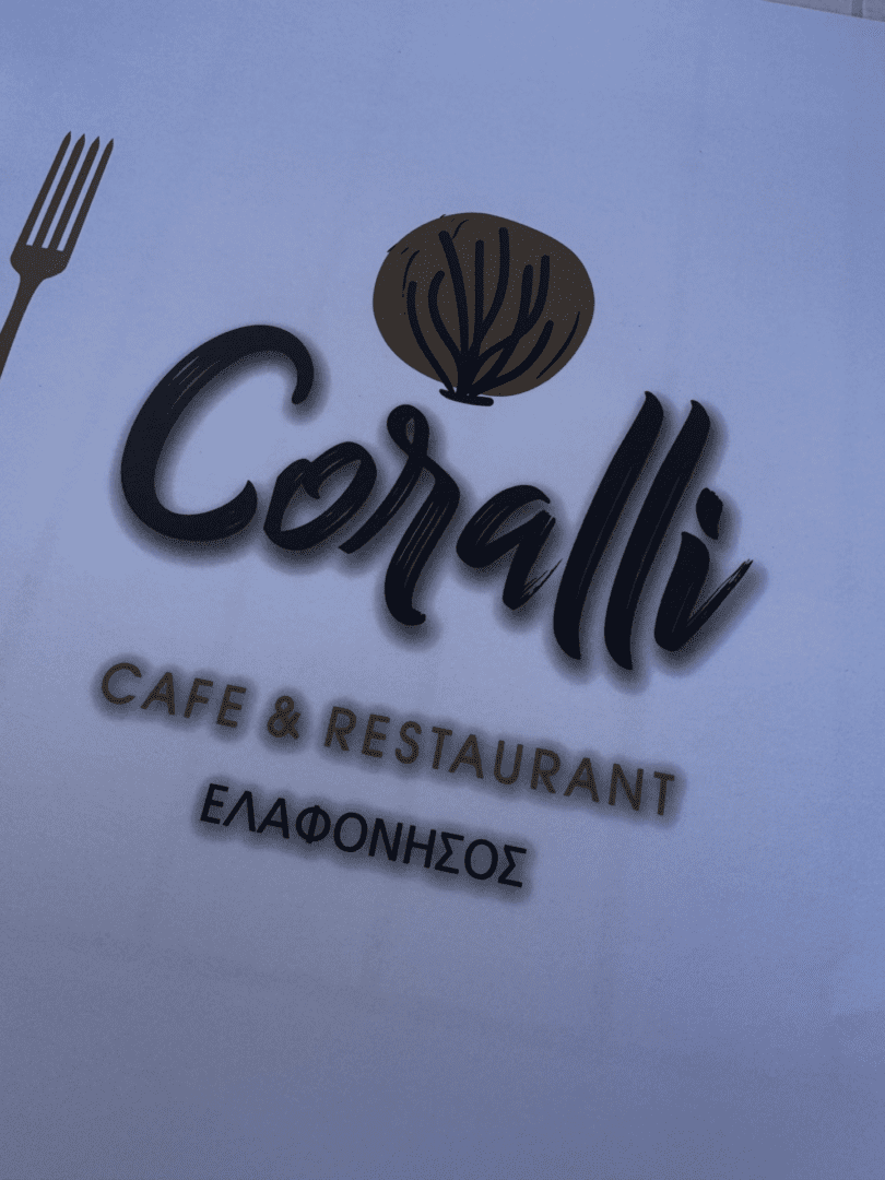 Logo of Coralli Cafe & Restaurant with a coral design.