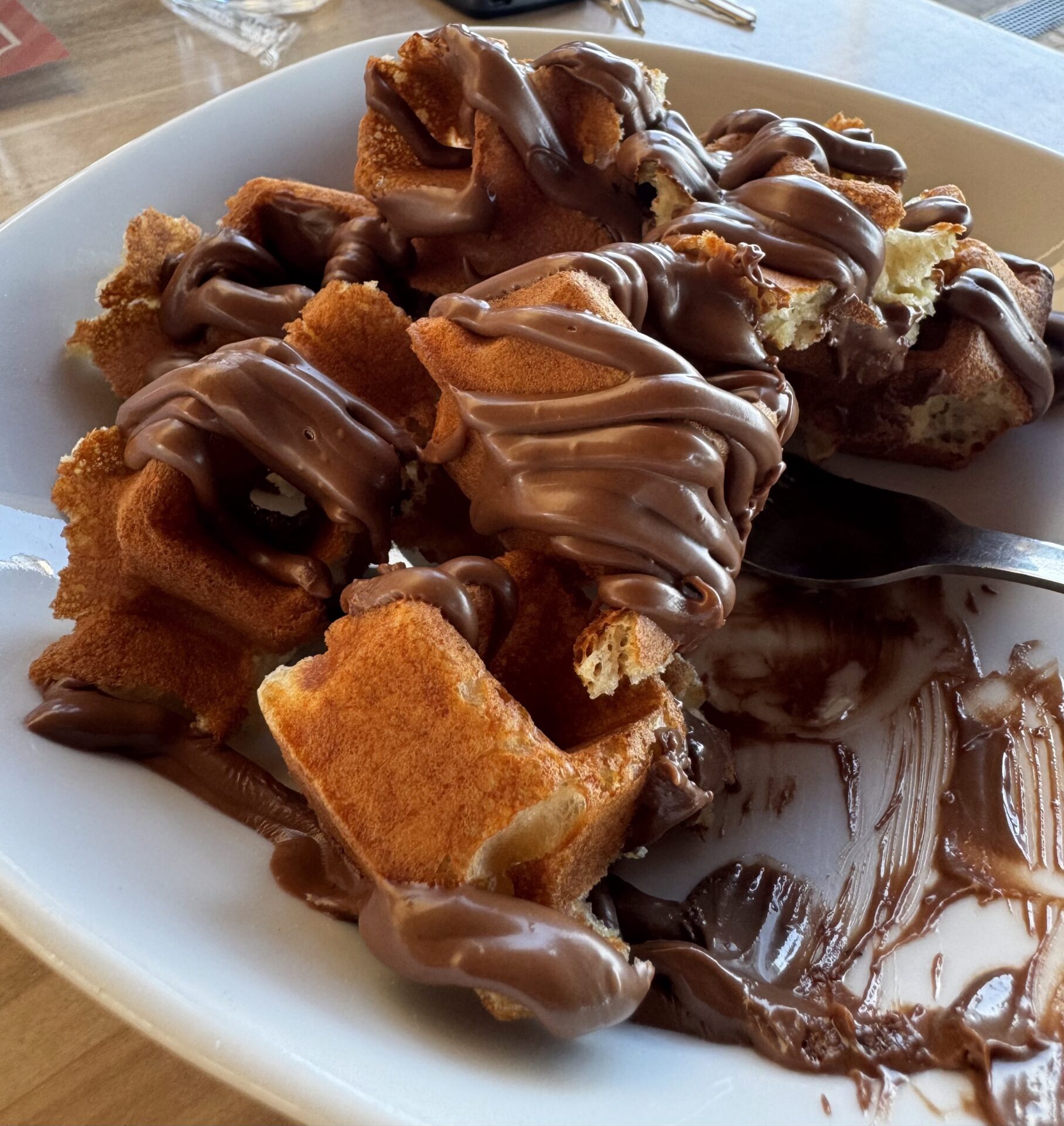 Delicious chocolate-covered waffles close-up