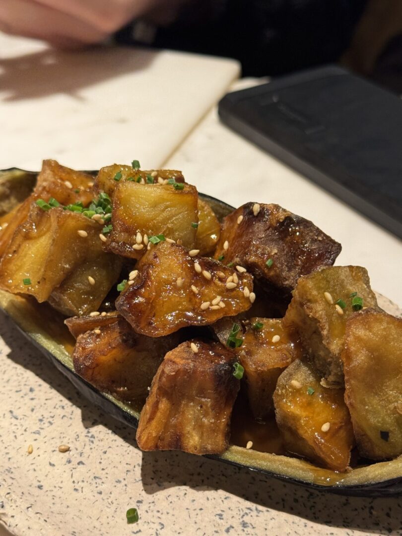 Chopped eggplant garnished with herbs