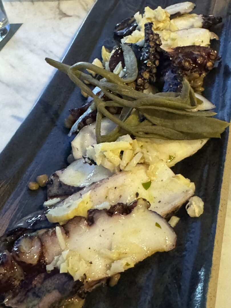 Gourmet seafood dish with garnish